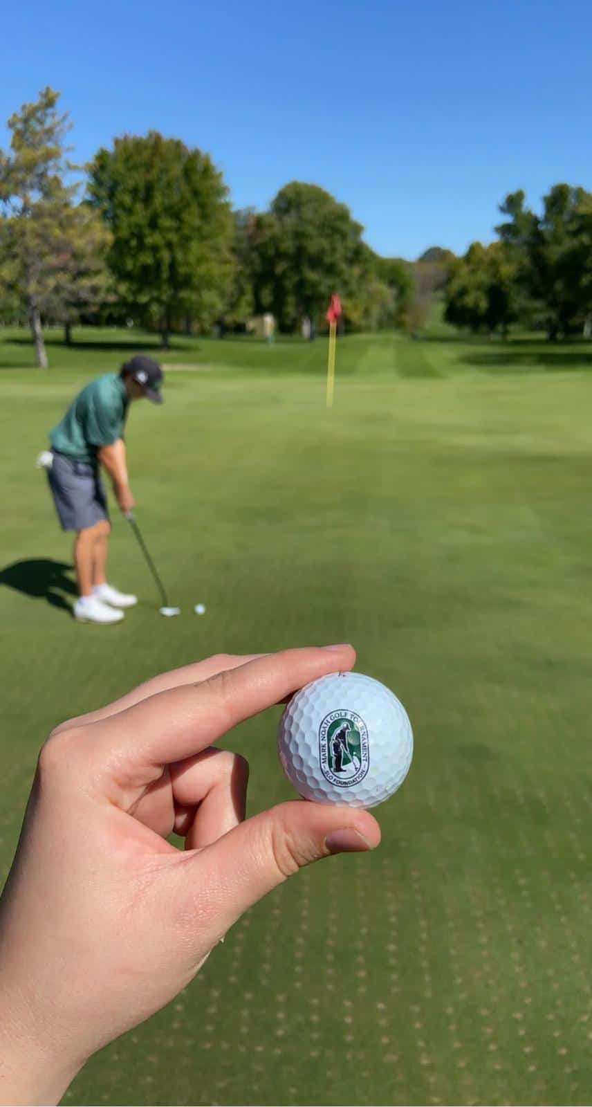 Mark Noah golf swing with close-up of golf ball